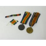A pair of Great War medals awarded to 241634 GNR.V.Hirst.R.A, comprising Victory medal and war medal