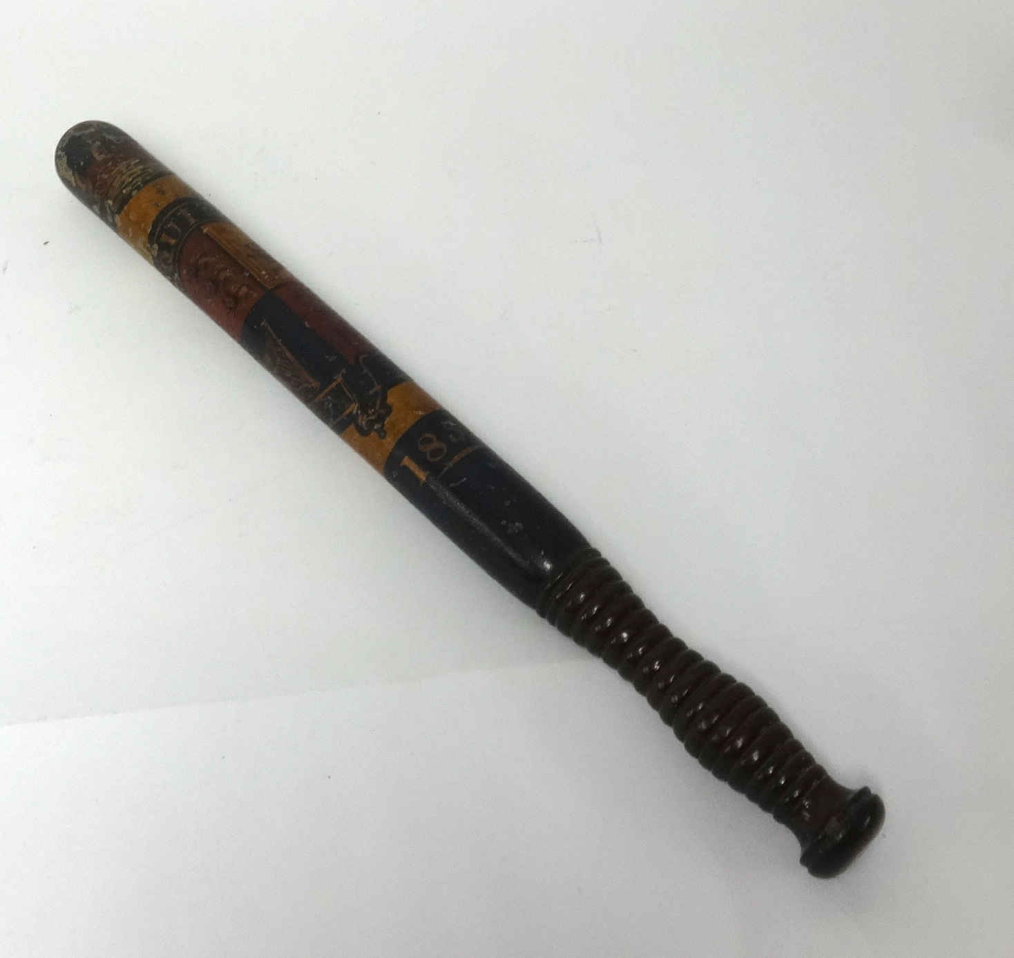 Victorian, police truncheon decorated with a crest and dated 1850, length 49cm.