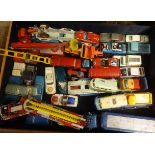 A collection of various Corgi diecast models, including Smiths Carrier van, Simon Snorkel, London