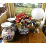 A pair of Lozol Ware, vases, matching planter and a brass oil lamp with opaque globular shade.