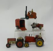 A collection of play worn Corgi and Dinky agricultural items plus some figurines and petrol pumps
