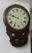 A Victorian oak cased drop dial wall clock.
