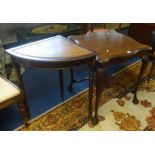 An early 20th century mahogany occasional table with lower tier and carved legs with claw & ball