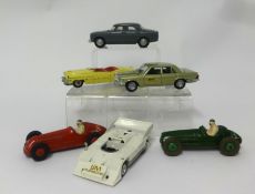 A tray of twenty six play worn Dinky toys, spot-on toys and continental items.