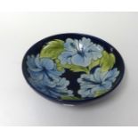 W. Moorcroft, bowl decorated with flowers, diameter 26cm.