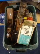 A collection of old woodworking tools, including Stanley planes, jack planes, moulding planes,