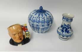 Royal Doulton Winston Churchill character jug D6907, 1992 together with two reproduction blue and