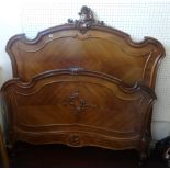 French carved walnut double bed.