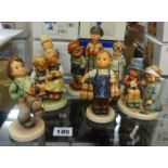 Goebel, Hummel, a collection of eight figures including Hummel Club figure and larger size all