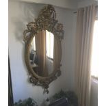 A large and ornate Victorian gilt framed mirror, overall size approx, 94cm x 69cm