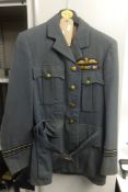 A WW II RAFI uniform, also badges, Airforce buttons, RAF cloth badges, Egypt cap badge, patches