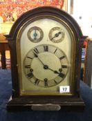 A early 20th Century bracket clock with striking and chiming movement on gongs with presentation