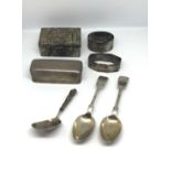 A 19th Century silver caddy spoon, a silver rectangular ring box, GS and SF, 80mm long, two silver