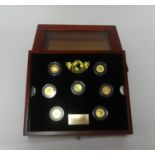 London Mint, The Magnificent Seven Collection of gold coins, limited edition number 0363/2000,