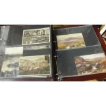 A collection of various general postcards in eighteen albums, not all complete, traditional and
