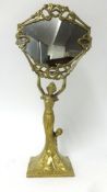 Brass Art Nouveau decorated figure mirror, height 50cm