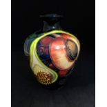 Moorcroft, a small vase, 'Queens Choice', No.03/4, height 11cm, boxed.