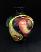 Moorcroft, a small vase, 'Queens Choice', No.03/4, height 11cm, boxed.
