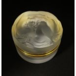 Lalique, France, Daphne, a glass powder box, signed 'Lalique, France', diameter 75mm.