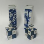 A pair of 20th century Chinese blue and white square vases and a of smaller modern vases (4).