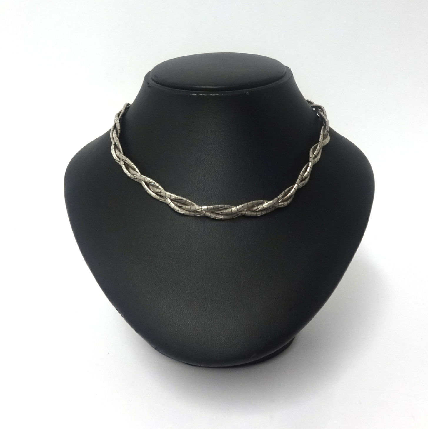 An Italian contemporary silver necklace, three strand of textured design, approx 44.7gms also a