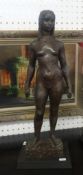 Mid 20th Century bronze effect sculpture of a standing lady, impressed marks to base 'KJ No92/100'