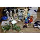 A collection of china and glassware including oriental dragons, Murano clowns, pottery wares and