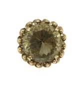 A large smokey quartz high set gold ring, (believed to be 14k set), weight 16.40gms, finger size R.