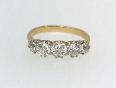 A five stone diamond ring, set in yellow gold, finger size O.