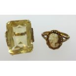 A 9ct citrine set ring, finger size K, and a 9ct cameo set ring (2).