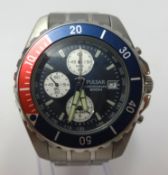 Pulsar, a gents stainless steel chronograph wristwatch with pepsi bezel in tin box.