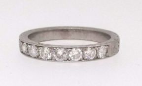 A platinum half eternity and diamond set ring (damaged), finger size N.