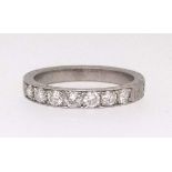 A platinum half eternity and diamond set ring (damaged), finger size N.