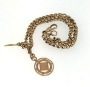 A 9ct gold watch chain with T-bar and pendant, 29.20gms.