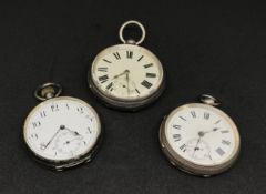 Three silver pocket watches, one back plate No.324227, movement No.14447 and the other back plate