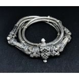 A two row chevron patterned circular rope style belt, 20th Century, with silver spacers and