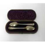 A pair of Geo III bright cut serving spoons, P.B and W.B (Bateman), in original fitted case.