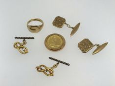A pair of 9ct gold cufflinks, a 9ct gold signet ring, a pair of gold and diamond set cufflinks (