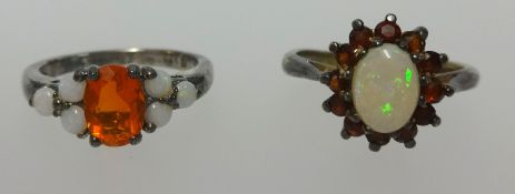 Two silver dress rings.