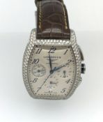 Longines, a good gents diamond set wristwatch, with box and papers.