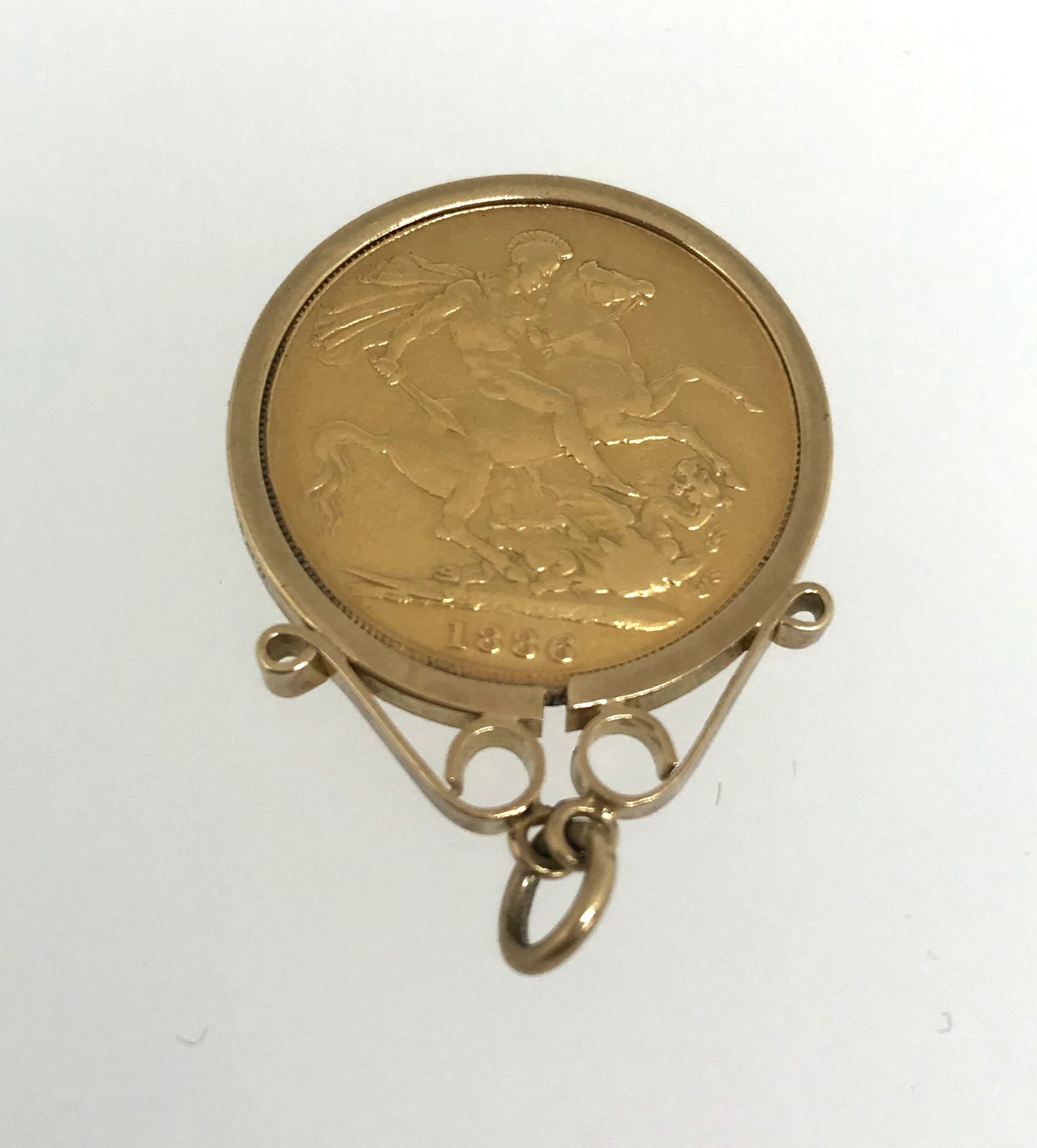 Victoria, 1886 sovereign, bunhead, M, mounted as a pendant, total weight 9.8gms. - Image 2 of 2