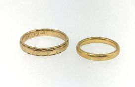 A 22ct gold wedding band, approx 4.2gms, finger size M and a 9ct gold wedding band, finger size V (