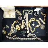 A collection of various dress jewellery, necklaces, bracelets, brooches, rings etc together with a