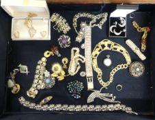 A collection of various dress jewellery, necklaces, bracelets, brooches, rings etc together with a