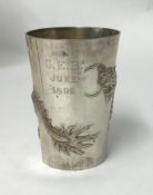 Chinese Export Silver, a beaker inscribed Luen Wo, Shanghai, with embossed dragon decoration, gilt