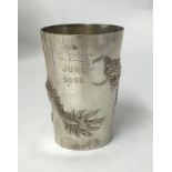 Chinese Export Silver, a beaker inscribed Luen Wo, Shanghai, with embossed dragon decoration, gilt