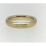 A 18ct gold wedding band with inner inscription 'Tanya 11/10/2014', finger size R, 7.50gm.