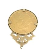 American, gold twenty dollar coin 1864 in ornate 9ct gold pendant (LWG), total weight 39.4gms.