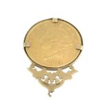 American, gold twenty dollar coin 1864 in ornate 9ct gold pendant (LWG), total weight 39.4gms.