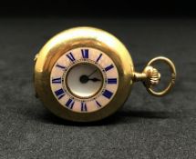 An 18ct gold miniature half hunter pocket watch, the back plate No.100677, with mother of pearl